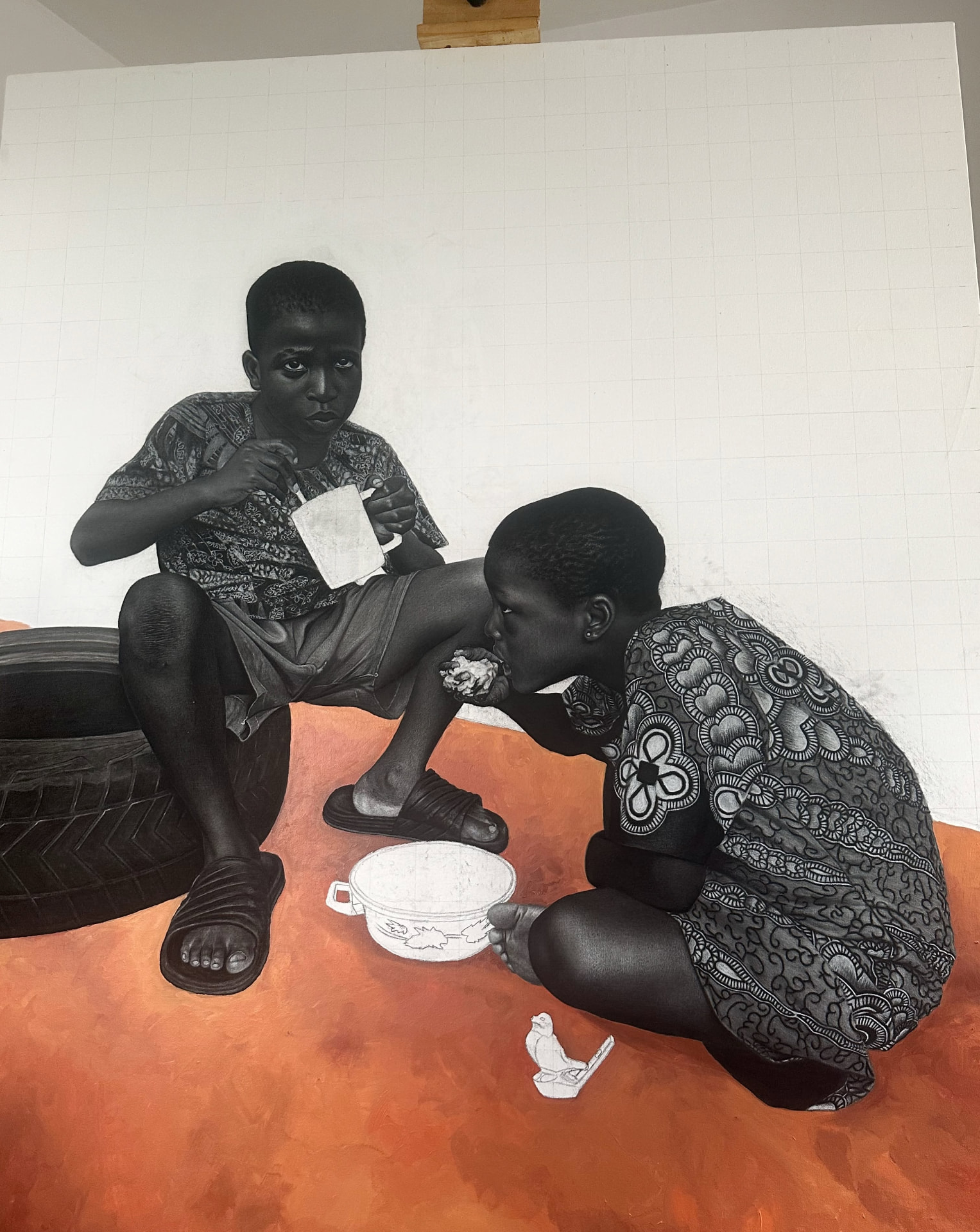 Œuvre de Hopex John : deux enfants partageant un repas, dessin hyperréaliste